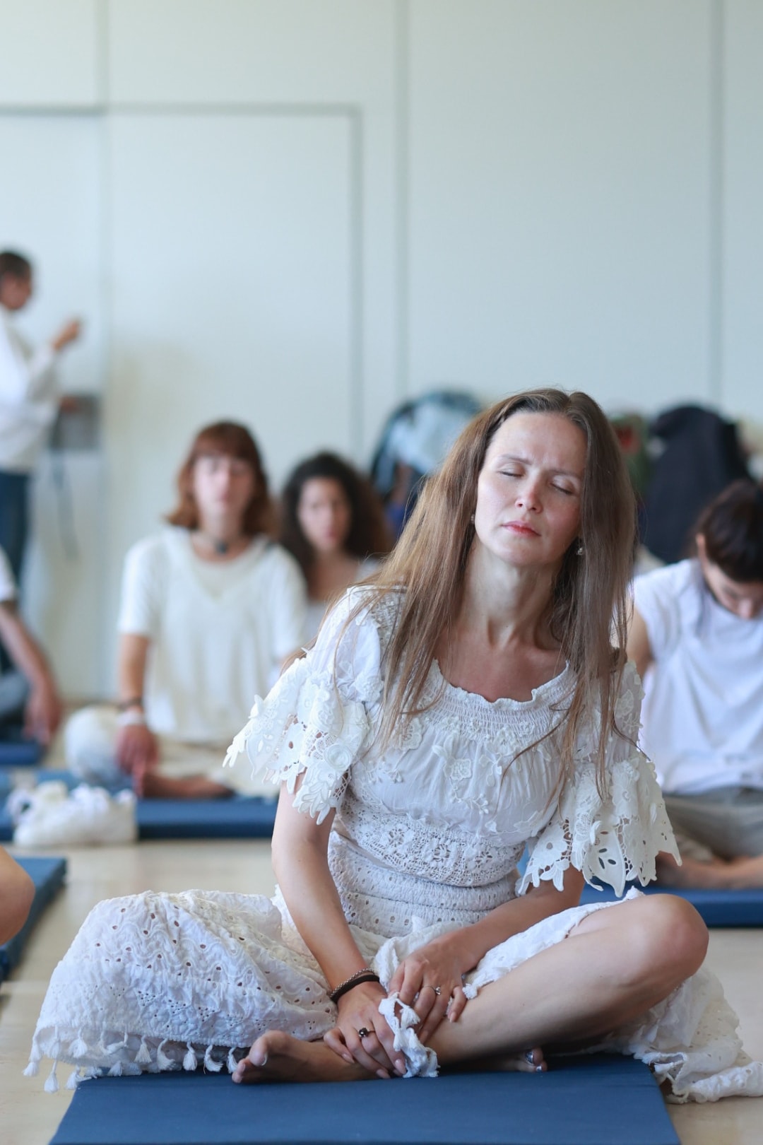 "Participants engaging in dynamic meditation at the Dao Therapy detox center in Thailand."