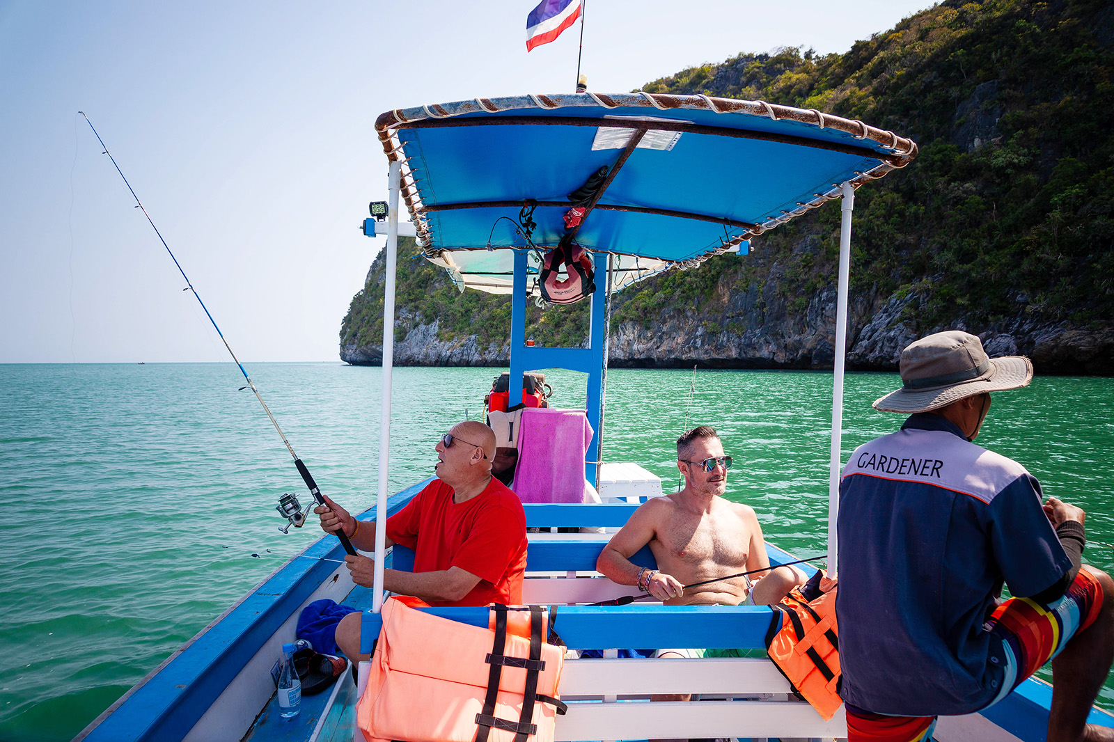 Tao Rehab patients enjoying a fishing activity, surrounded by nature, as part of their therapeutic experience